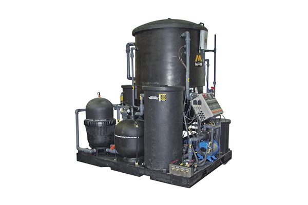 A black machine with two tanks and a pump.