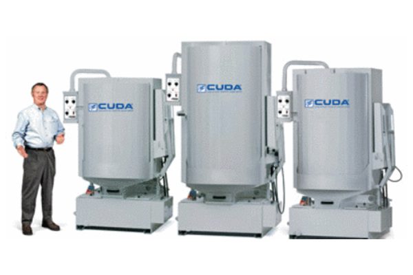A group of three large tanks with different sizes.